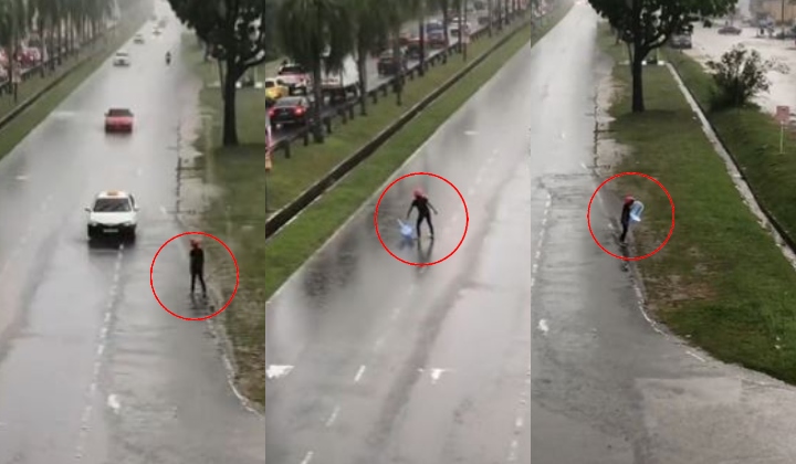 [Video] Pemuda Sanggup Redah Hujan Untuk Alihkan Kerusi Di Tengah Jalan Raih Pujian Netizen